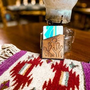 Western tooled leather card holder